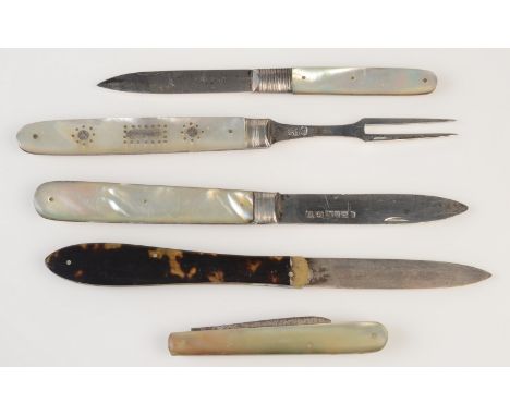 A George III folding silver and a mother of pearl fork, together with three folding, silver bladed fruit knives and one other