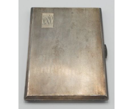 A silver engine turned cigarette case, Birmingham 1945, 6.9oz.