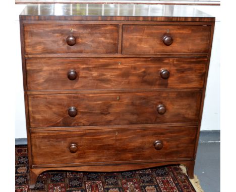 A late Georgian large mahogany chest with ebony lines, fitted two short and three long graduated drawers on splayed bracket f