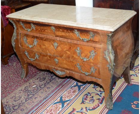 A French Louis XV style bombe marquetry commode with marble top and ormolu mounts, maximum width 133.5cm.