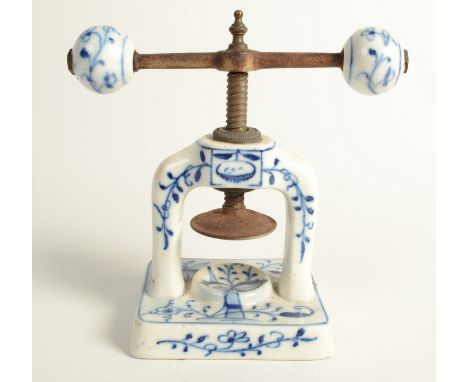 A Meissen 'Onion' pattern nut cracker made as a book press, height 12.5cm.   Condition report:  Generally in good condition. 