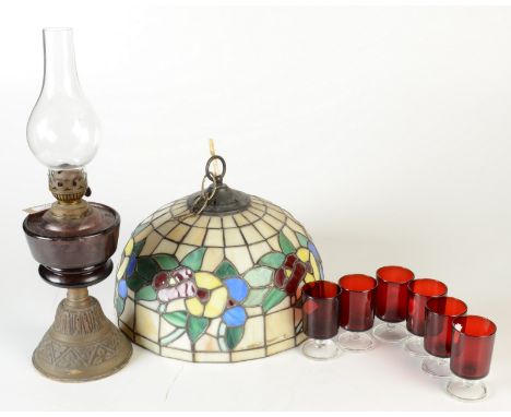 A brass and coloured glass oil lamp, height 43cm, a Tiffany style stained glass hanging lamp shade, 30.5cm and six French rub