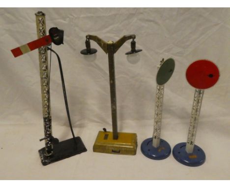 A Bing Gauge 1 tin plate signal with ladder and lantern, Gauge 1 twin station light and two French Hornby o gauge circle sign