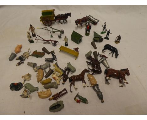 A selection of Britains and other farm items including pony and cart, horse roller, plough, figures, animals etc