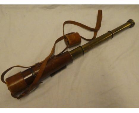 A First War Officer's brass three-draw telescope "Reconditioned for John Barker &amp; Son Kensington by Broadhurst Clarkson &