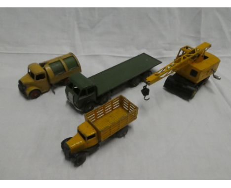 Dinky Supertoys - Foden open lorry; produce lorry; Coles mobile crane and one other (4)