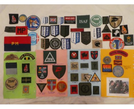 A collection of over 170 various Army cloth Formation signs including British Forces in Bosnia, Kosovo, Macedonia, Iraq, Afgh