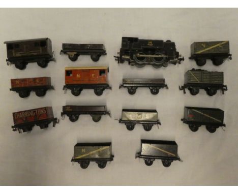 Trix Twin OO gauge - 0-4-0 diecast tank engine and 13 tin plate goods wagons
