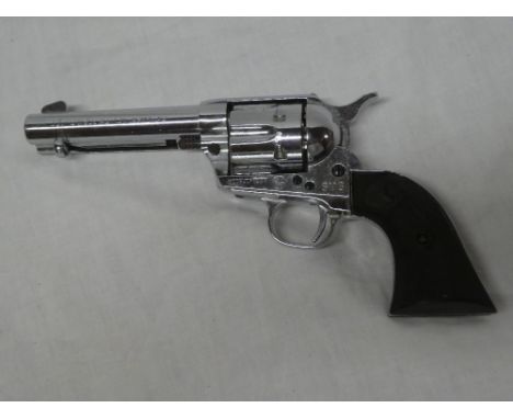 A replica blank firing model Colt single action Army revolver