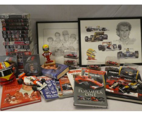 A selection of Formula One memorabilia including "Tribute to Ayrton Senna" coloured print and one other F1 print, various boo