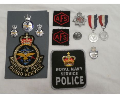 A Civil Defence Instructor's lapel badge,NFS cap badge and button, AFS cloth badges, two Camborne/Redruth 1939/1945 commemora