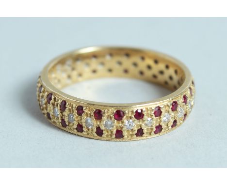 AN 18CT GOLD, RUBY AND DIAMOND RING.