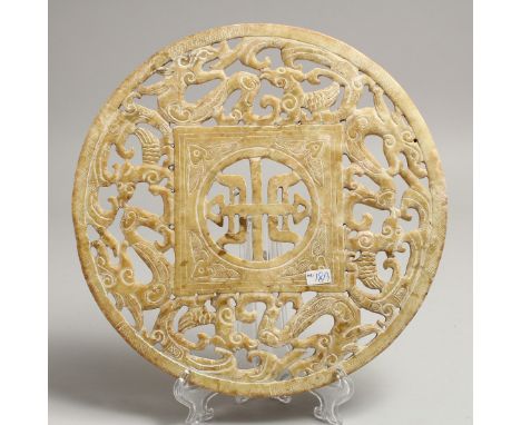 A CHINESE PIERCED JADE CIRCULAR DISH. 9.5ins diameter.