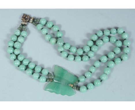 A JADE BUTTERFLY NECKLACE.