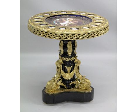 A VERY GOOD FRENCH SEVRES MANNER GILT CENTRE TABLE the top with a large portrait porcelain panel and eighteen portraits of la