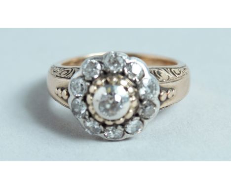 A VICTORIAN DIAMOND SET CLUSTER RING.