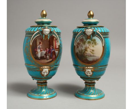 A VERY GOOD PAIR OF 19TH CENTURY SEVRES VASES AND COVERS, light blue ground with panels of figure and flowers. 15ins high.