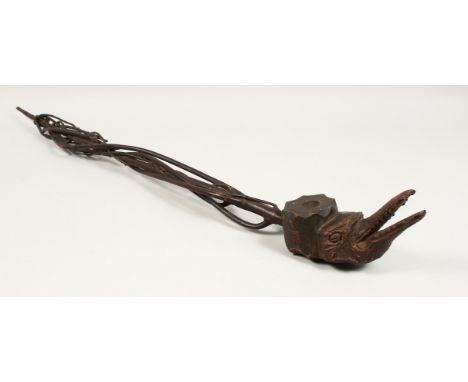 A FOLK ART CROCODILE PIPE. 36ins long.