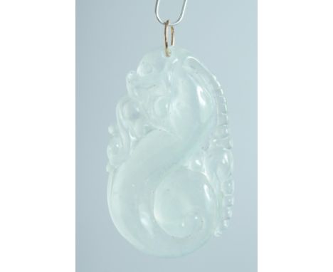 A GOLD TOP ICY JADE PENDANT.