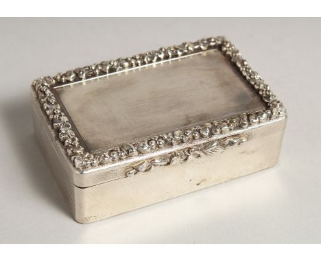 A GOOD WILLIAM IV SILVER TABLE SNUFF BOX, engine turned with fluid border. 3.5ins long, 2.25ins diameter, 1.5ins deep. London