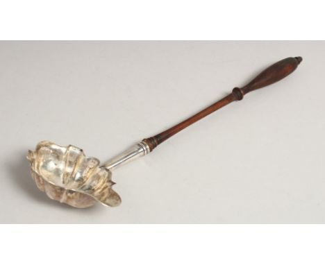 A GEORGE III SILVER PUNCH LADLE with turned wood handle. London 1772. Maker, W. B.