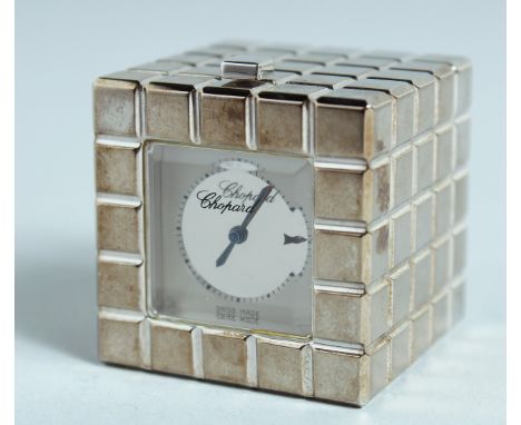 A CHOPARD ICE CUBE CLOCK, 1.25ins high. No. 51/8898/01 1076520 in original blue box.