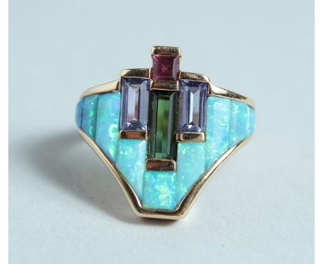 AN OPAL SAPPHIRE AND RUBY MODERN RING.