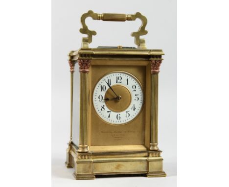 A GOOD GOLDSMITHS &amp; SILVERSMITHS BRASS CARRIAGE CLOCK with repeat action and column supports. 6ins high.