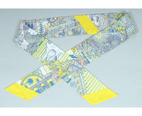 A HERMES LE MAXI - TWILLY SLIM CRAVAT in a box.