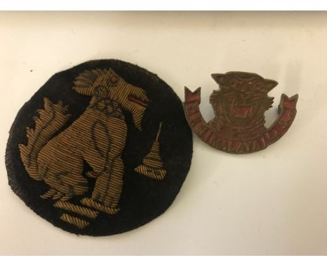 A Far East WWII, Malayan People Army field made cap badge and Chindit patch