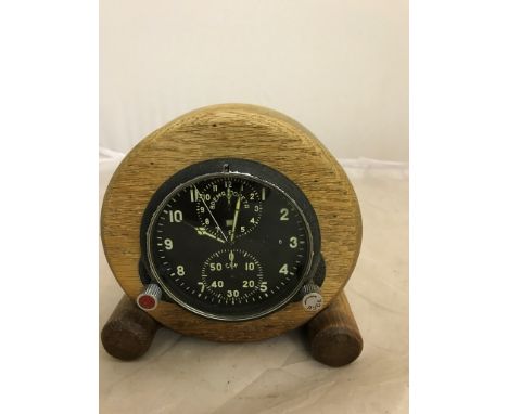 A Russian Chronometer from MIG Fighter plane c1960`s, with good luminosity and in perfect working order, in wooden mount for 