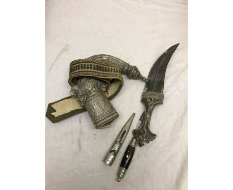 A 19th century silver Arabian dagger; together with one other