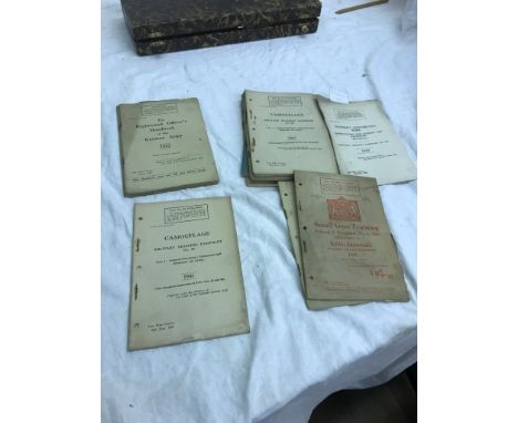 A quantity of military issue manuals, small arms, training, snipers, camoflauge, anti aircraft, German army, bayonet, machine