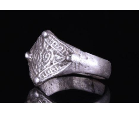 Viking Era, Ca. AD 900 - 1100.A Viking ring crafted from silver, featuring a flat-sectioned round band that gently expands to