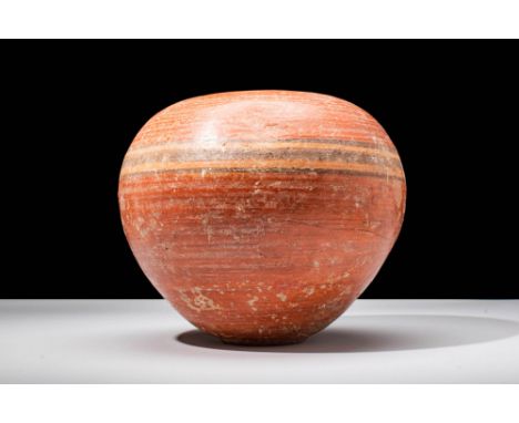 Late Predynastic to Early Dynastic Period, Ca. 3100 - 2700 BC.A globular, bichrome earthenware vessel. The body is decorated 