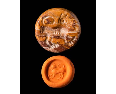 Ca. AD 200 - 400.A Sasanian stamp seal depicting a dog facing right with highly stylised details. The seal has a globular bod