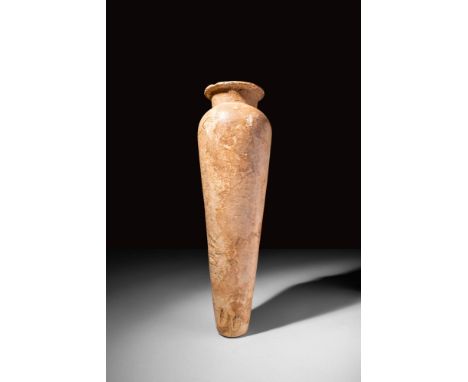 Late Period, Ca. 664 - 332 BC.A stunning vase of an elegant honey-yellow alabaster. The top-heavy vessel is defined by a flat