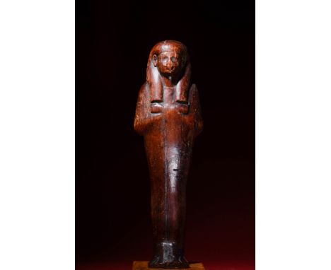 New Kingdom, Ca. 1408 - 1372 BC.A tall wooden ushabti from the New Kindom possibly depicts Sethi I (father of Ramesses II). S