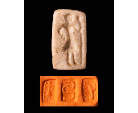 Ca. 3nd - 2rd Millenium BC.A triangular Western Asiatic stamp seal depicting a standing god with a scepter. On the second sid