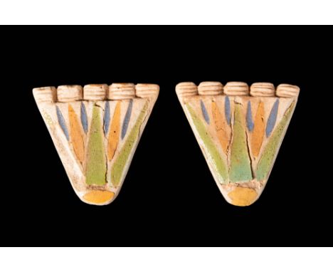 New Kingdom, 18th Dynasty, Ca. 1353 – 1336 BC.A pair of delicate faience lotus flower tiles. These could have been inlaid in 