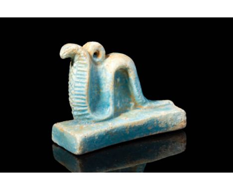 Late Period, Ca. 664 - 332 BC.A Late Period Uraeus faience amulet. Amulets representing animals were attributed to a deity: a