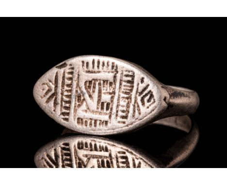 Ca. AD 1000 - 1200.A medieval Seljuk silver ring. The bezel is almond shaped and decorated with geometric motifs in imitation