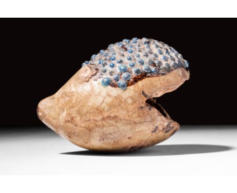 New Kingdom, Ca. 1550 - 1069 BC.An Egyptian faience hedgehog, depicted with a long muzzle and incised eyes. The hedgehog has 