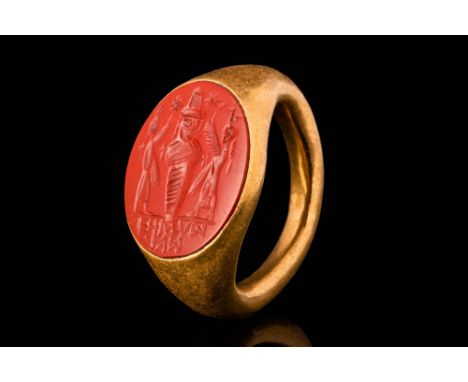 Ca. AD 100 - 300.A Roman 21 ct gold finger ring with a jasper intaglio depicting the ritual of Osiris. For similar see: Catal