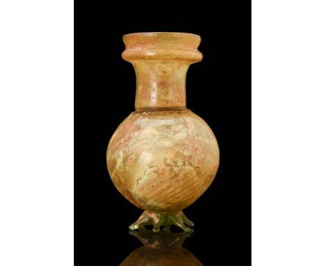 Ca. AD 100 - 300.A Roman glass flask with a translucent olive colour. The vessel has a rounded body and tubular neck that exp