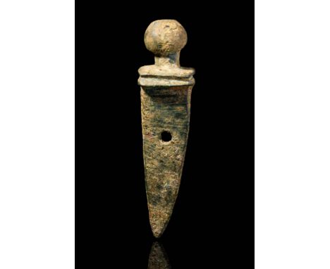 Ca. AD 100 - 300.A Roman necklace pendant shaped like a gladius sword. This type of item was worn not only by legionaries but