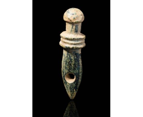 Ca. AD 100 - 300.A Roman necklace pendant shaped like a gladius sword. This type of item was worn not only by legionaries but
