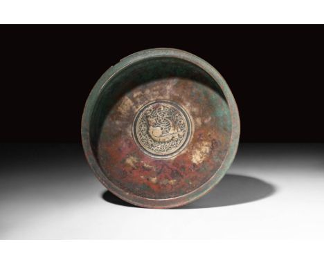 Ca. AD 1100 - 1300.An medieval copper alloy, gilded circular tray from the Seljuk period. The interior of the item is decorat