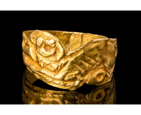 Ca. 600 - 400 BC.A Scythian gold finger ring depicting probably a lion, shown with open mouth and claws. The band is composed