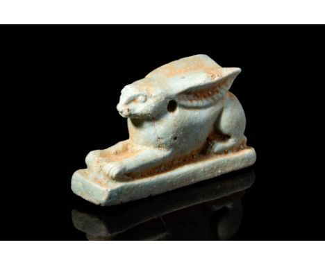 Late Period, Ca. 664 - 332 BC.A Late Period faience hare-shaped amulet. Amulets representing animals were attributed to a dei